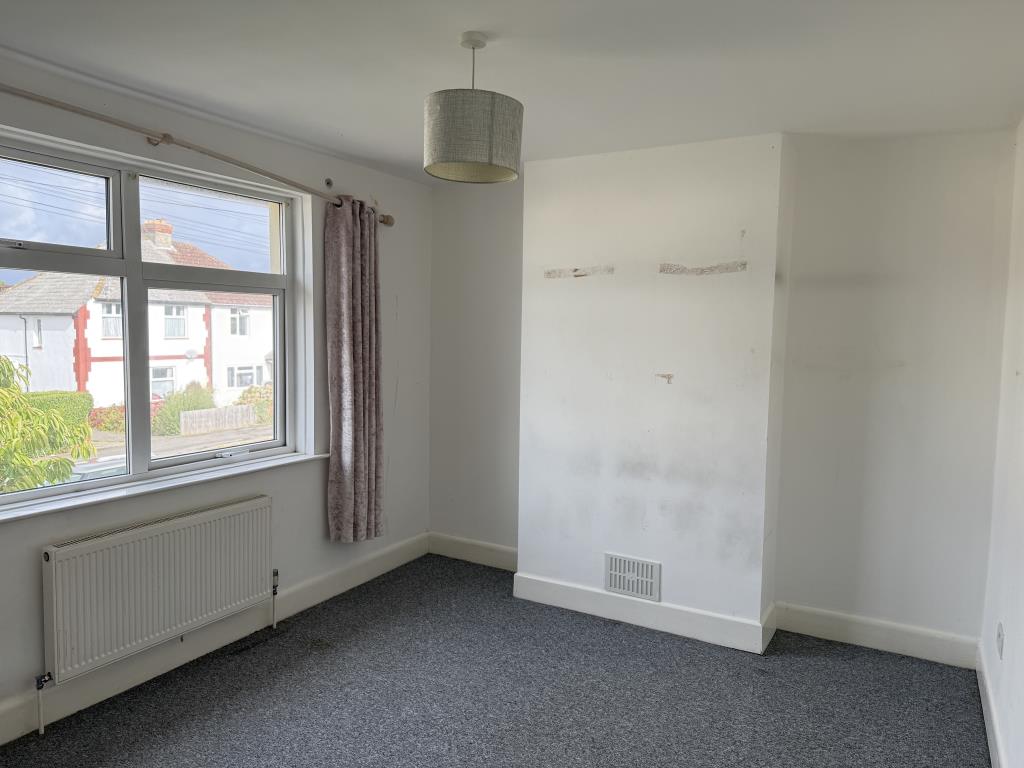 Lot: 124 - THREE-BEDROOM SEMI-DETACHED HOUSE - Bedroom one with white walls and grey carpet